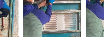 Close view of Earl's old layered coatings during stripping and surface preparation